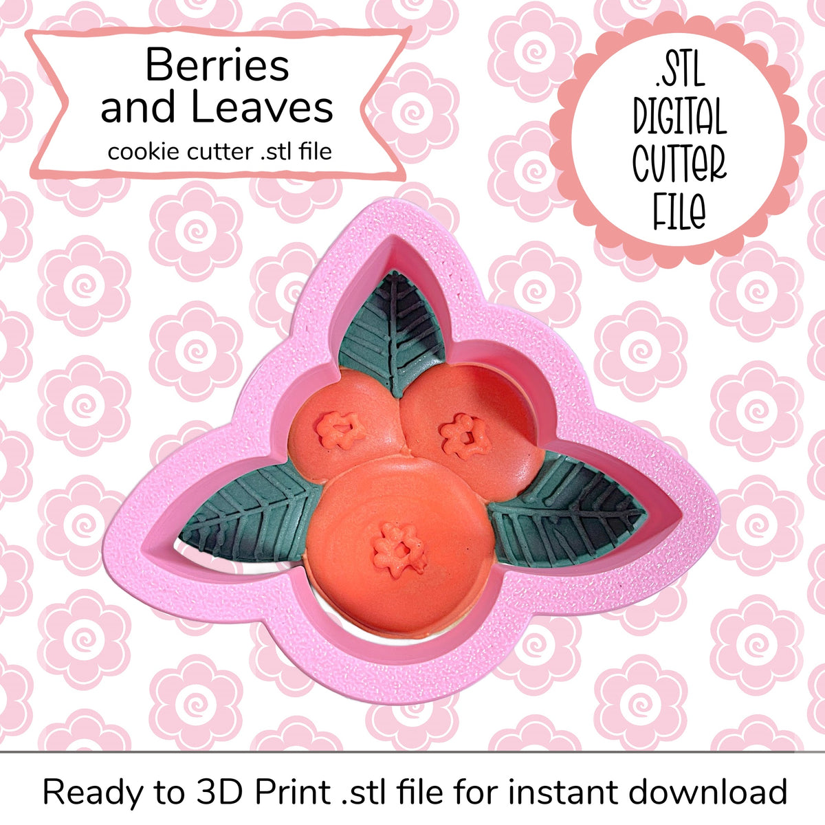 Pink silicone cookie cutter shaped like berries and leaves with orange berry molds and dark green leaf cutouts for baking