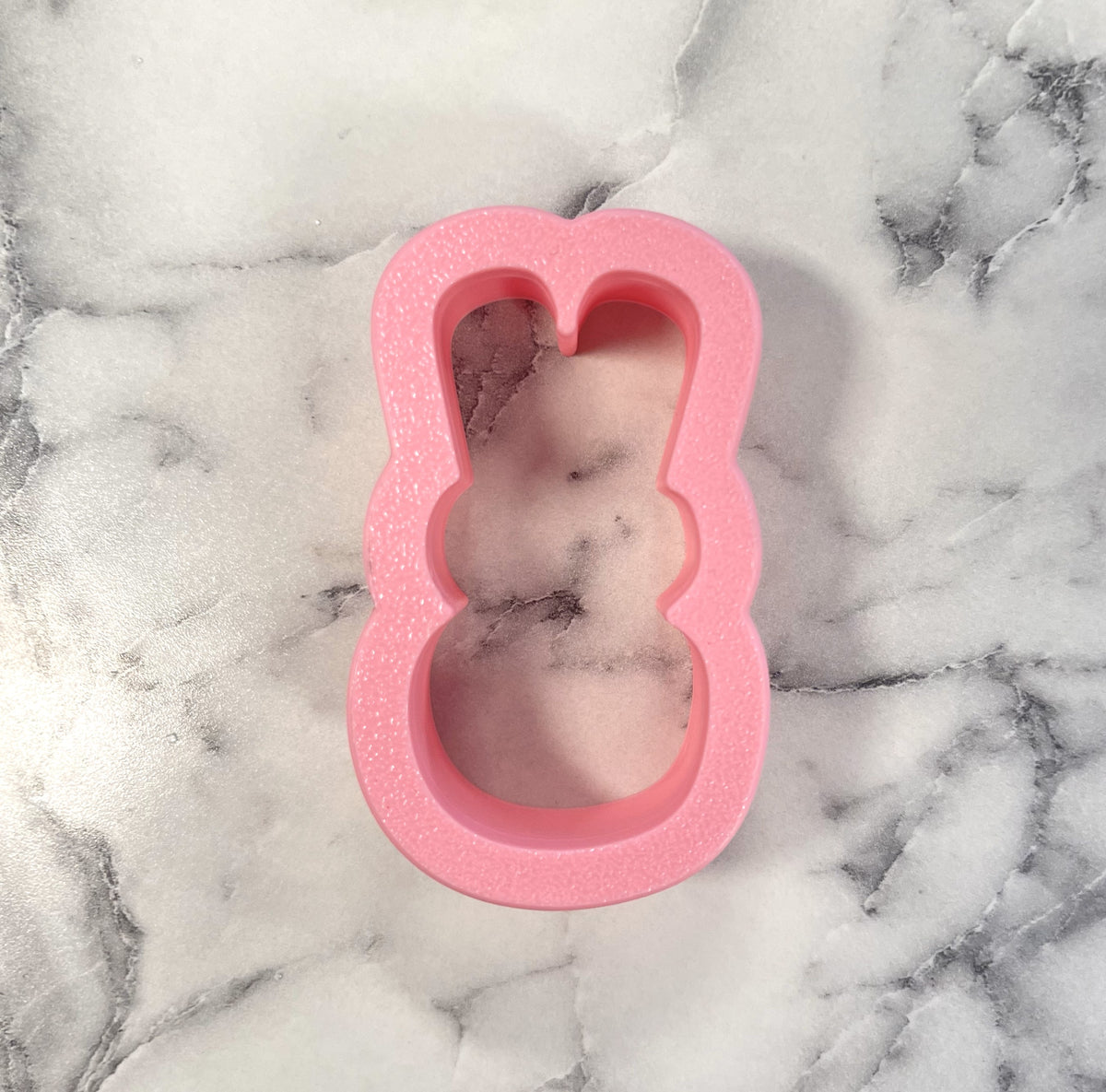 Mini bunny peep flour box cookie cutter in pink glittery silicone mold shaped like a bunny for baking and crafting