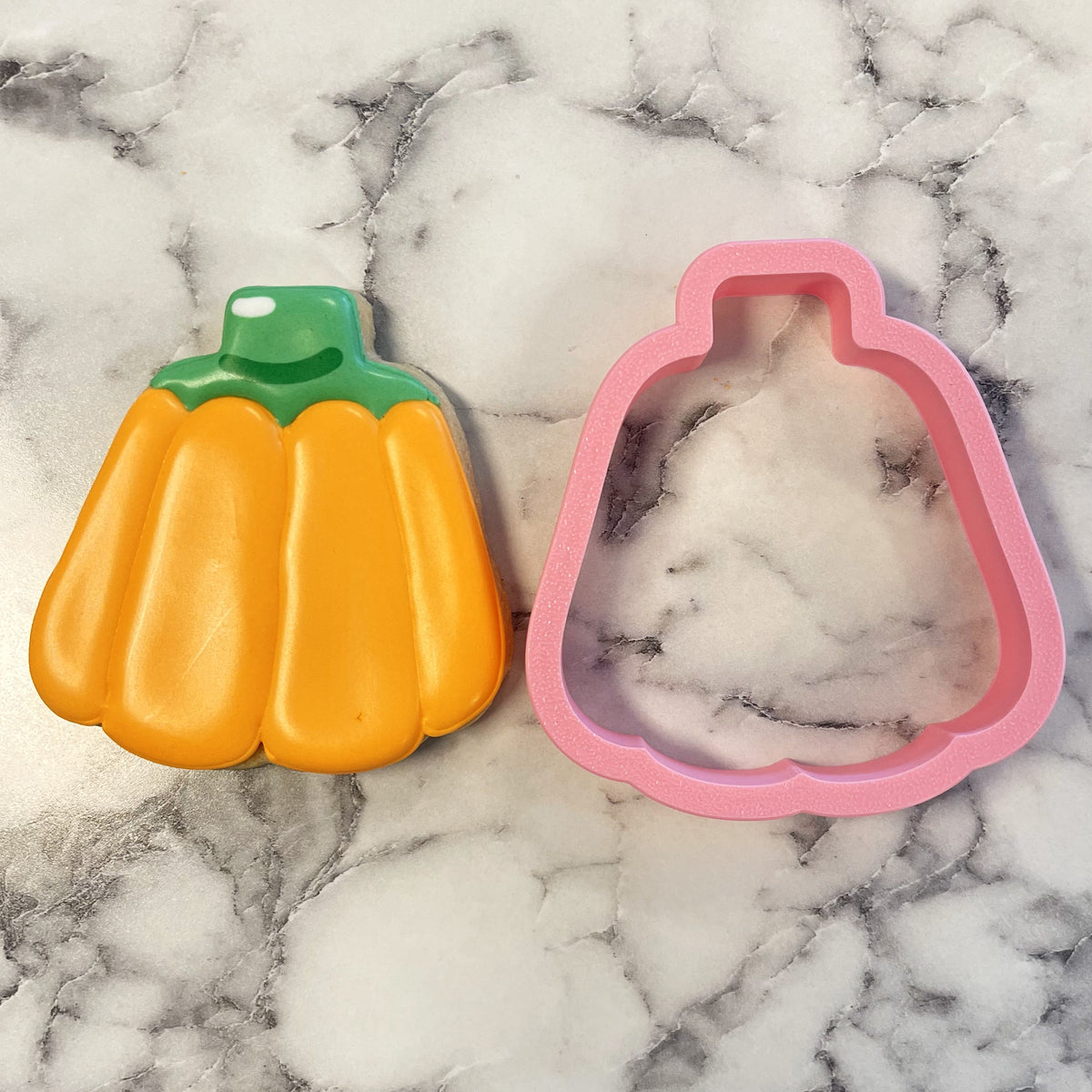 Orange pumpkin and pink candy corn shaped metal cookie cutters for candy pumpkin flour box club baking kit