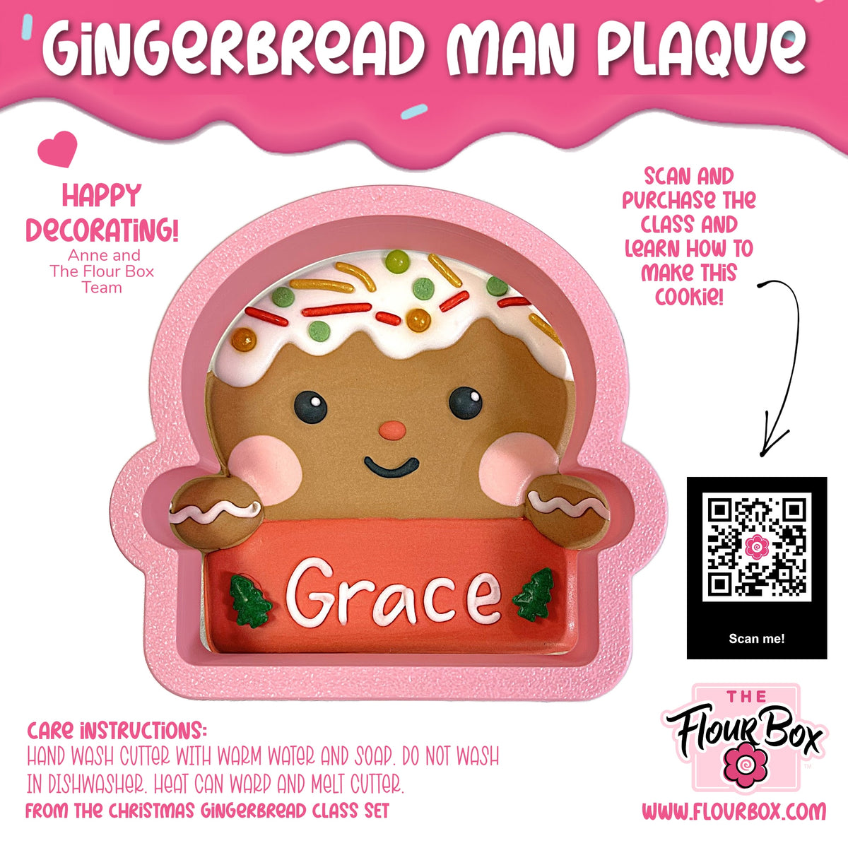 A pink-framed gingerbread man plaque cookie cutter with white icing and colorful sprinkles holding an orange grace sign