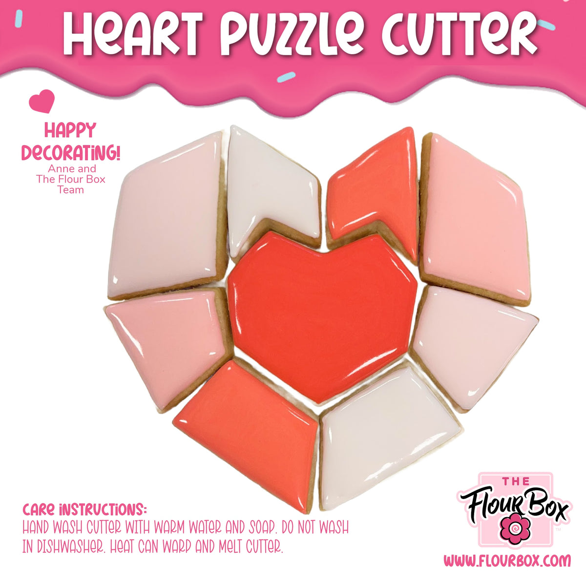 A vibrant red and pink heart puzzle cookie cutter set with glossy icing-coated sugar cookies arranged geometrically