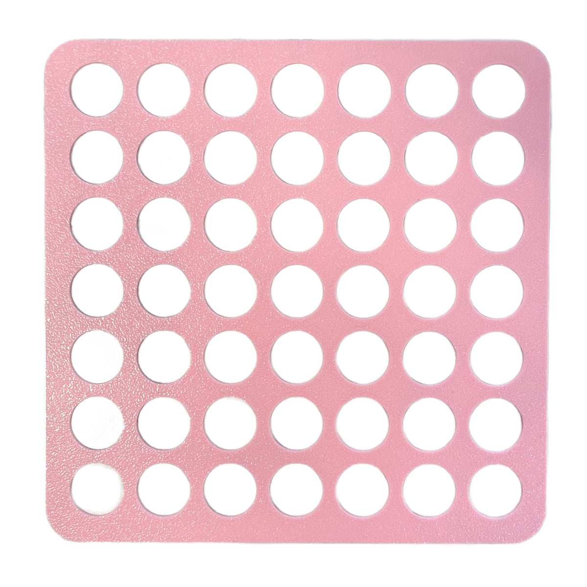 Pink square silicone dot large sprinkle stencil mat with evenly spaced circular cutouts for decorating cakes