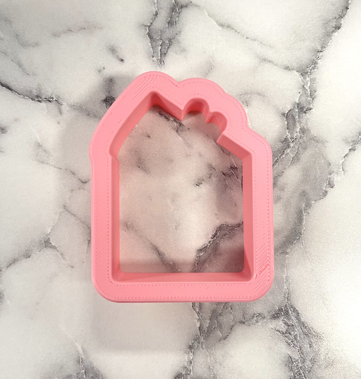 Pink mini tall cake slice cookie cutter made of metal shaped like a house for baking and decorating cookies