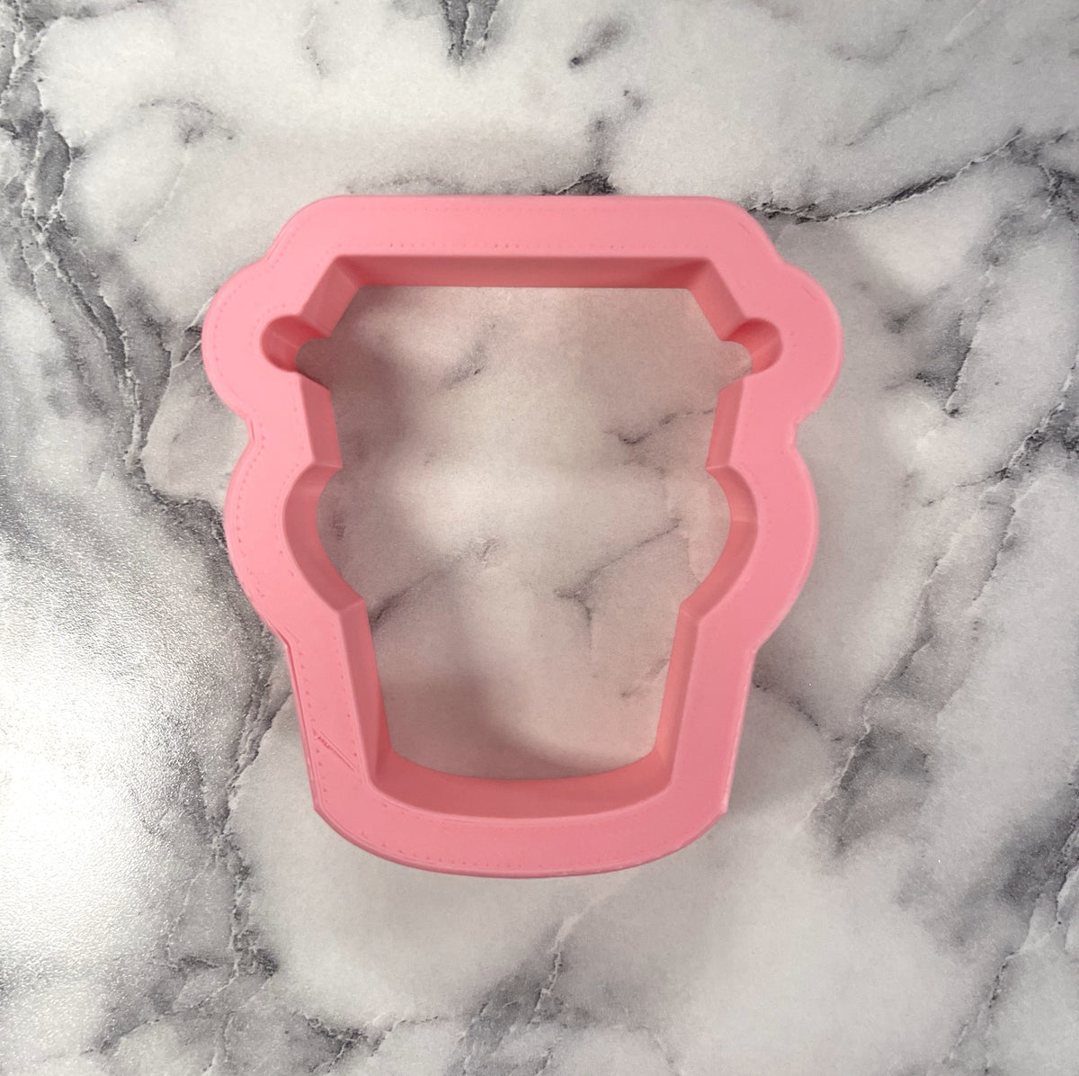 Pink silicone ice cream cup mold with scalloped edge and two handles for mini latte with heart cookie cutter set