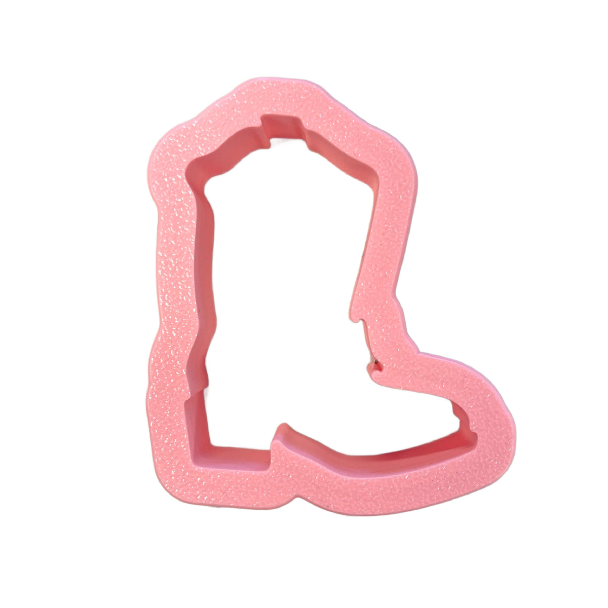 Mini western boot cookie cutter made of pink glittery foam for western themed baking and crafts