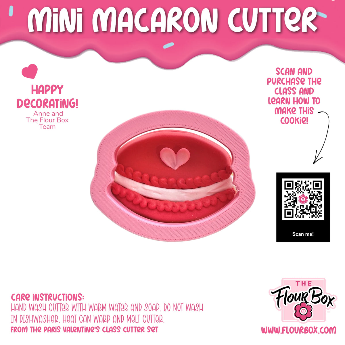 Pink silicone mini macaron cookie cutter shaped like a heart with red and white icing details for baking