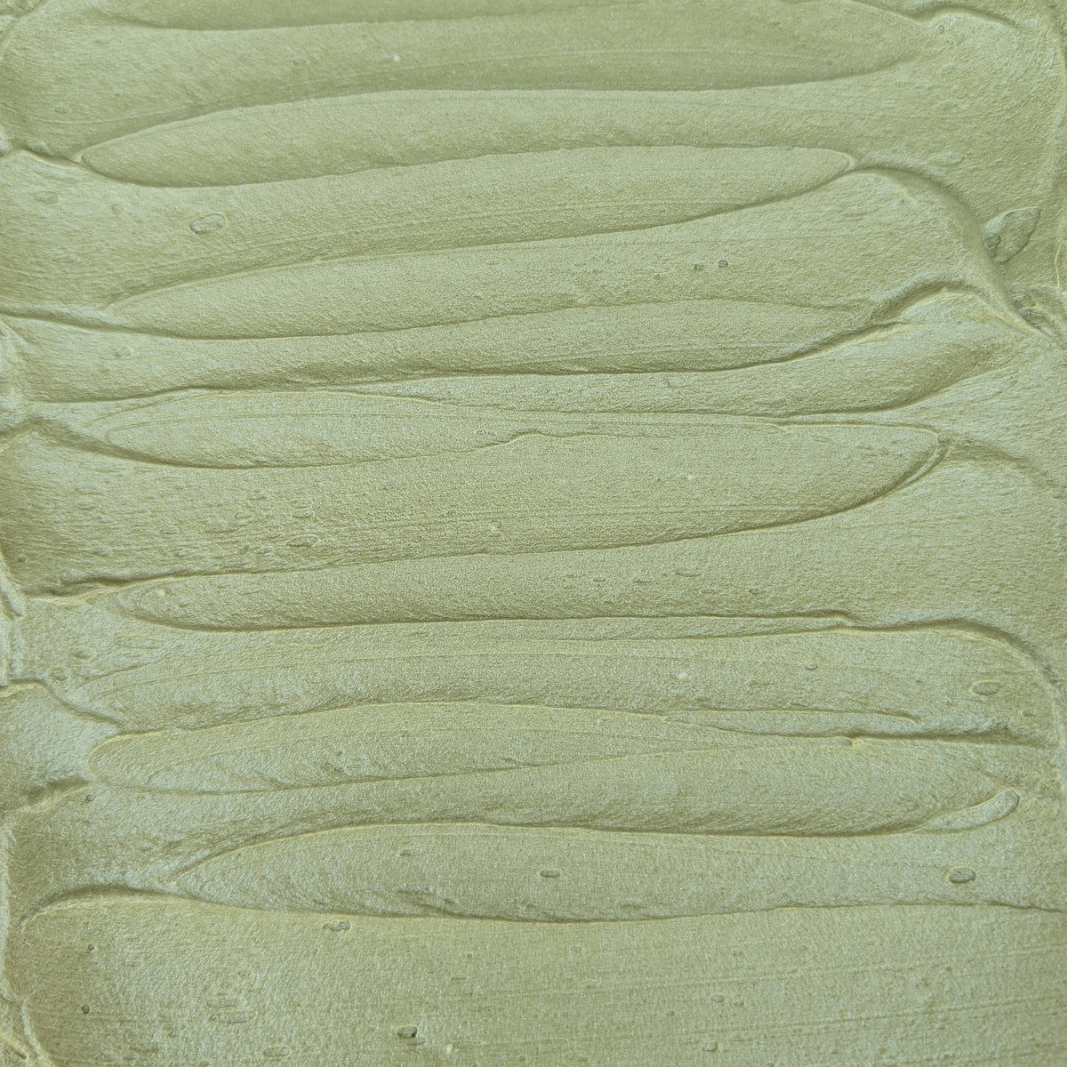 Natural Green Chefmaster 10ml liqua-gel textured light green coloring paste with smooth wavy ridges and glossy finish