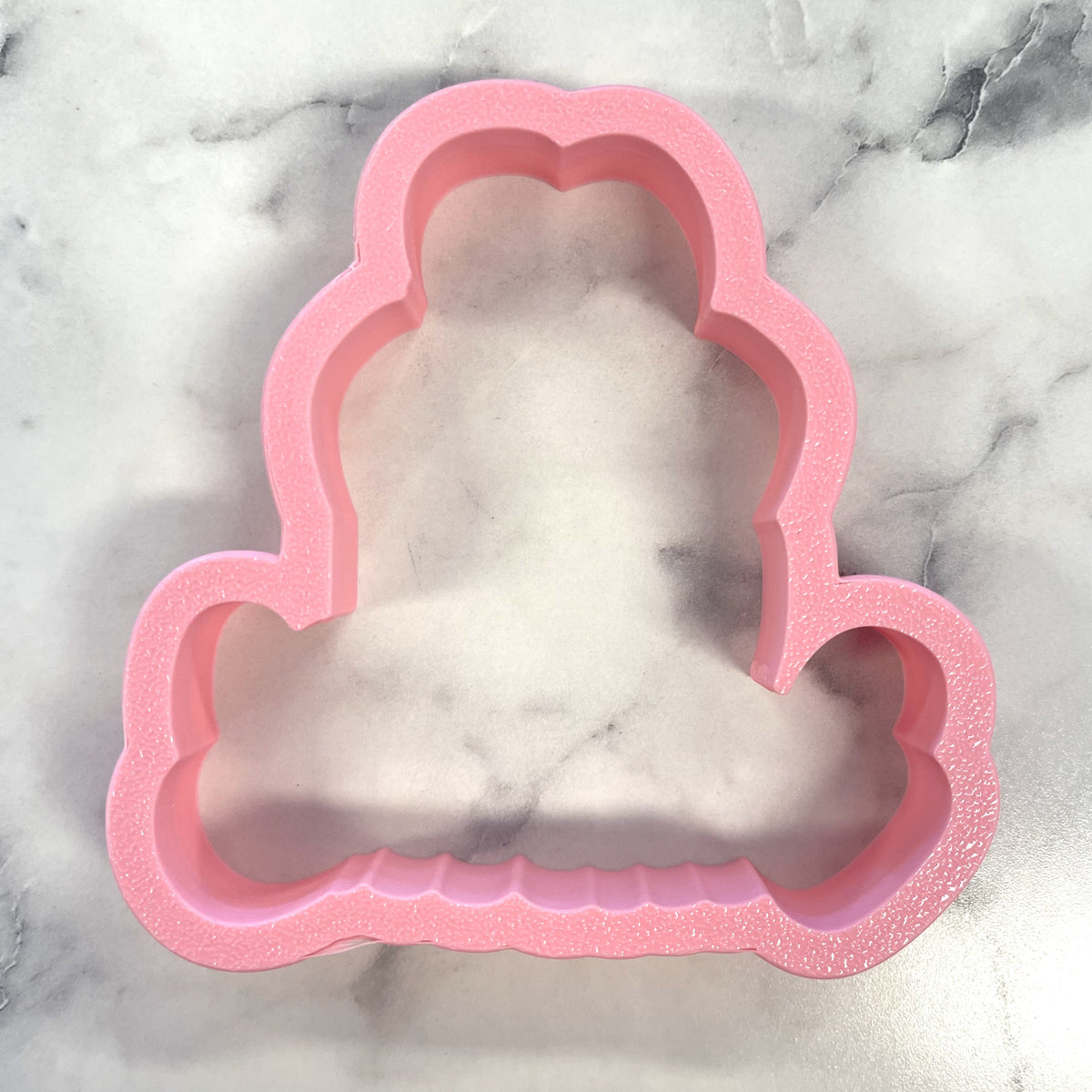 Pink glittery silicone cookie cutter shaped like a cloud for so glad i am yorchid plaque with stencil use