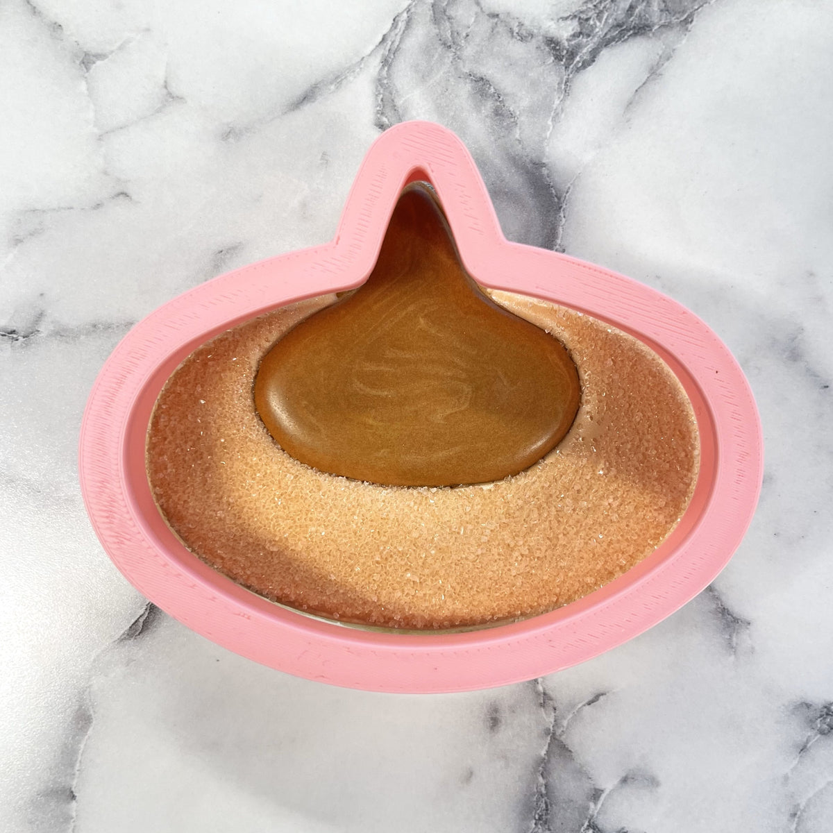 Pb blossom cookie cutter pink silicone hersheys kiss mold filled with golden brown sugar and glossy caramel center