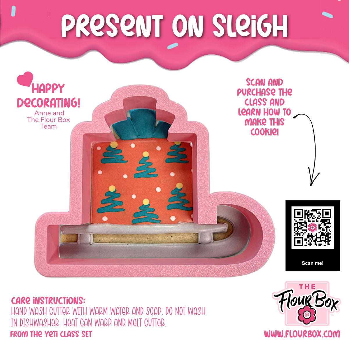 Pink silicone present on sled cookie cutter shaped like a sleigh carrying an orange gift with teal trees and white dots
