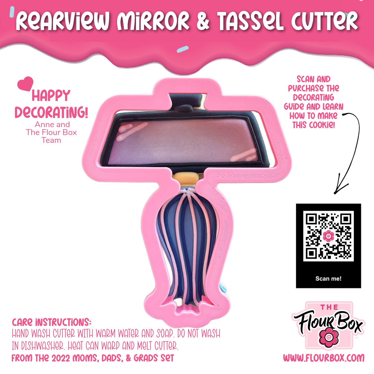 Pink plastic rearview mirror and tassel cookie cutter with black reflective surface and blue pink striped tassels inside mold
