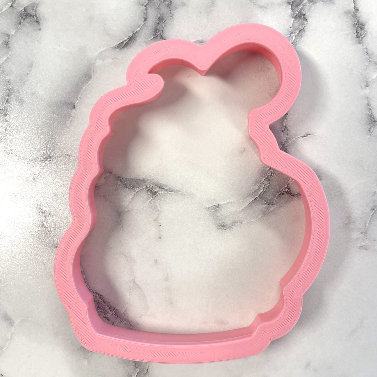 Pink silicone bunny-shaped cookie cutter designed for santa mug cookie cutter baking use