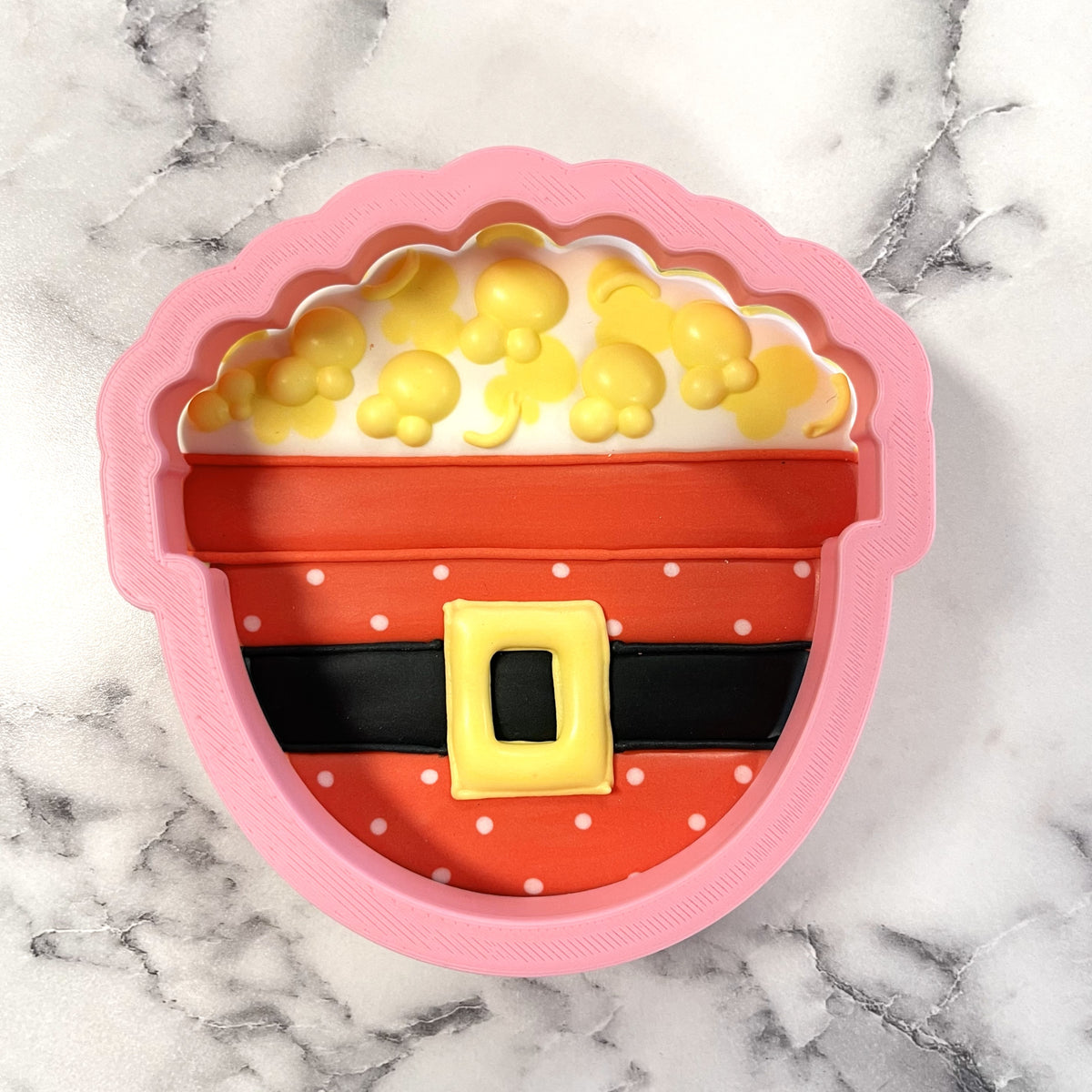 Santa popcorn bowl cookie cutter pink silicone shaped like popcorn bucket with yellow popcorn red and white polka dot interior