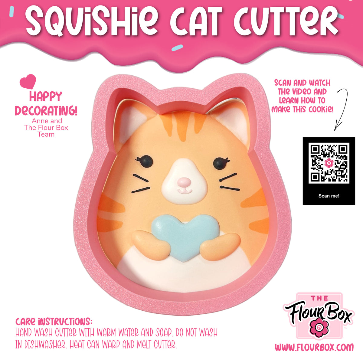 Pink silicone squishie cat cookie cutter with orange and white stripes holding a light blue heart-shaped detail