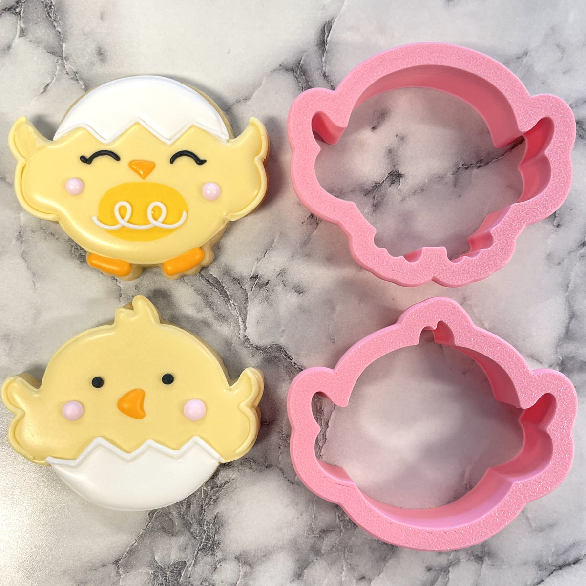 Mini tumbling chicks 2-cutter set with pink silicone chick cookie cutters with a soft matte finish