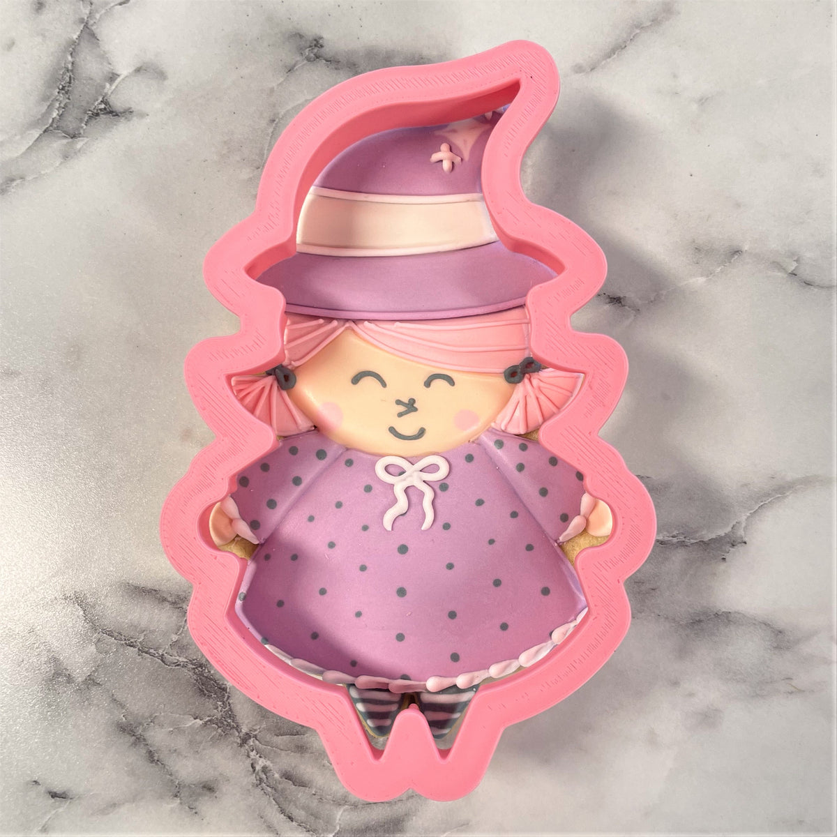 Witch cookie cutter pink silicone witch mold with purple hat polka-dot dress and striped leggings for baking