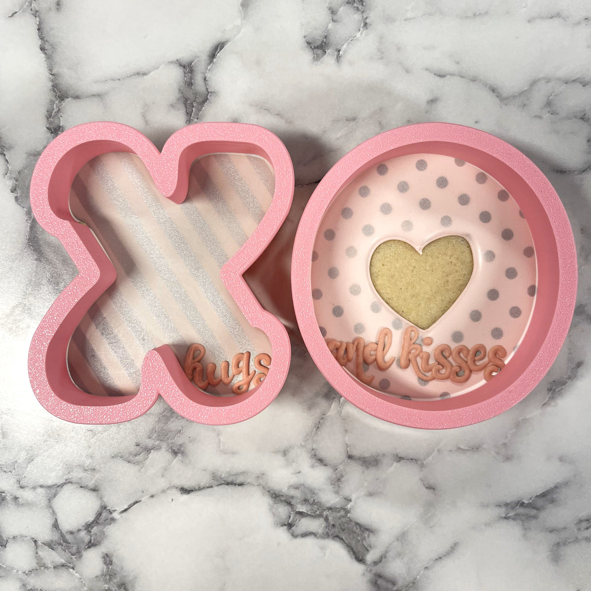 Pink silicone xo cookie cutter bundle shaped like xo and heart with hugs and kisses for baking and decorating