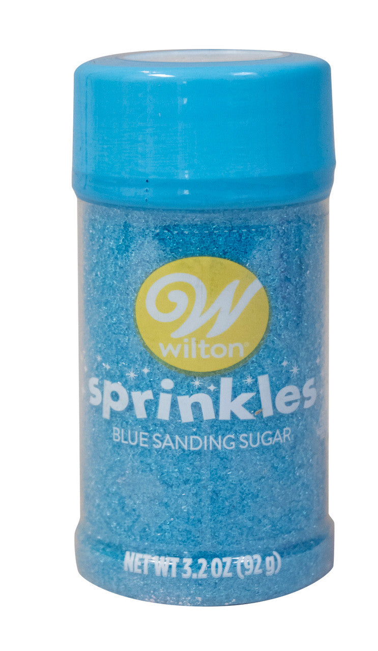 A vibrant blue wilton small sprinkle jar filled with fine blue sanding sugar crystals and a matching lid