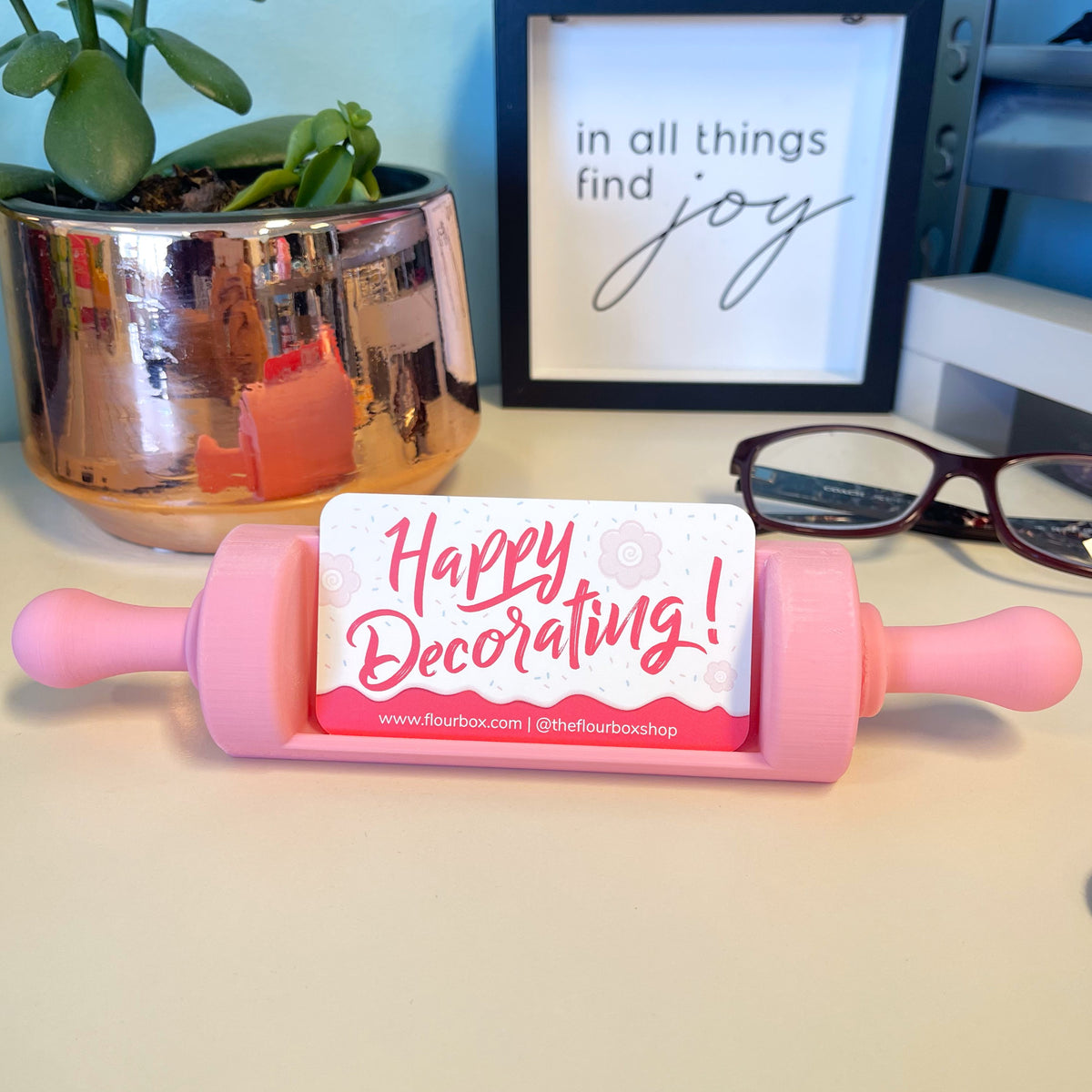 Pink silicone rolling pin with happy decorating business card holder for flour box display and organization