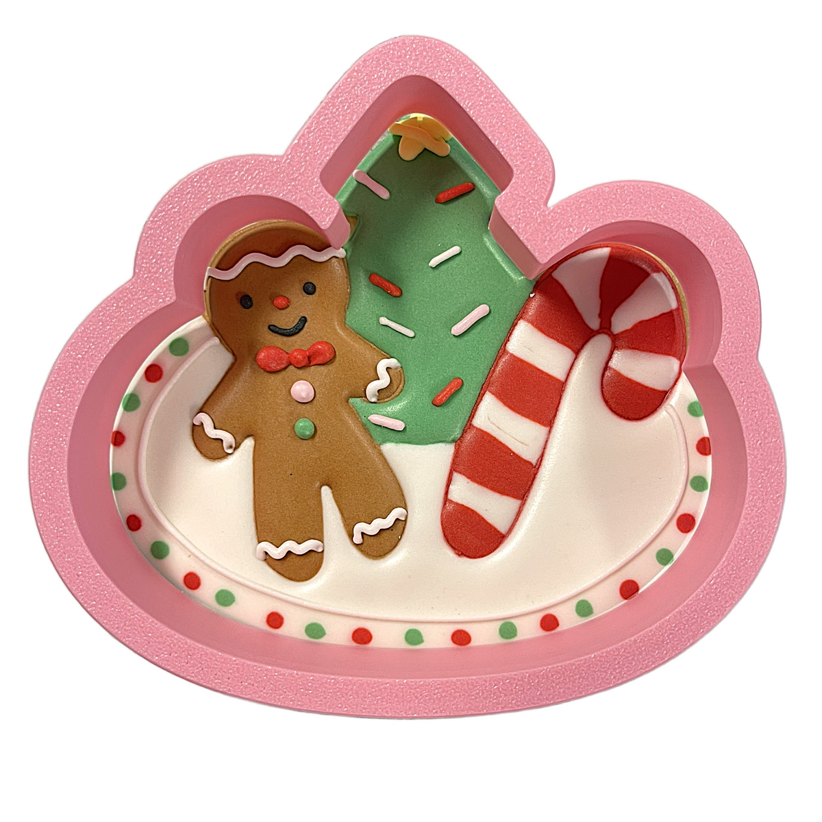 Pink christmas-themed silicone baking mold with gingerbread man and green tree candy cane shapes for cookie plate cutter