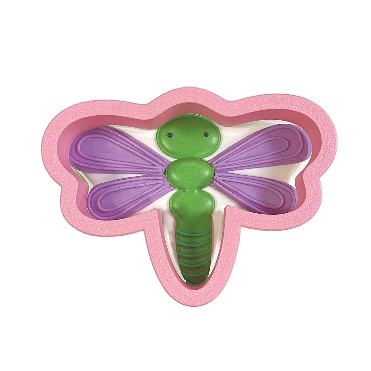 Pink foam dragonfly cookie cutter with green body and purple wings from dragonfly floppy flower flour box club flip design