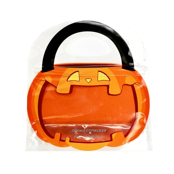 Orange pumpkin-shaped ceramic jack-o-lantern cookie jar with black handle and yellow triangular eyes for halloween use