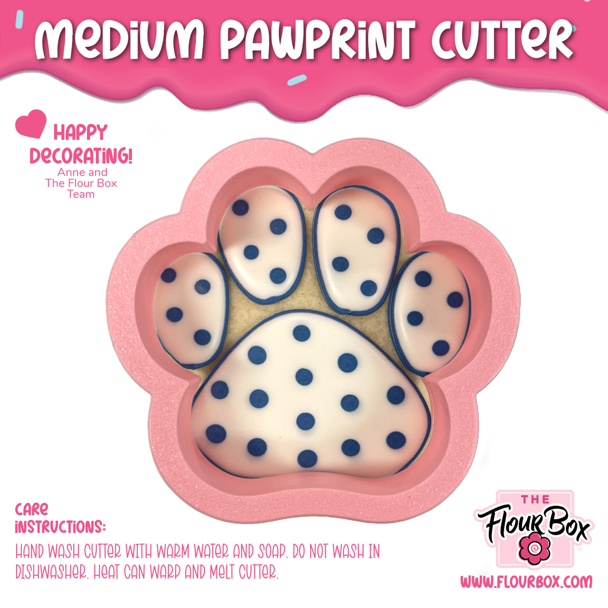Pink medium pawprint cookie cutter with white interior blue polka dots and black outlines for baking use