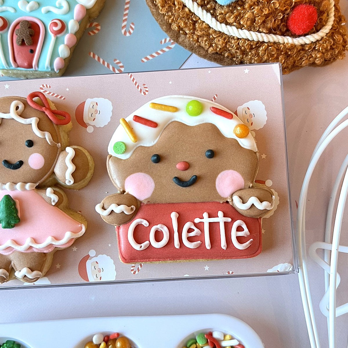 Mini christmas gingerbread cookie cutter bundle featuring a gingerbread girl with white icing hair and colorful sprinkles
