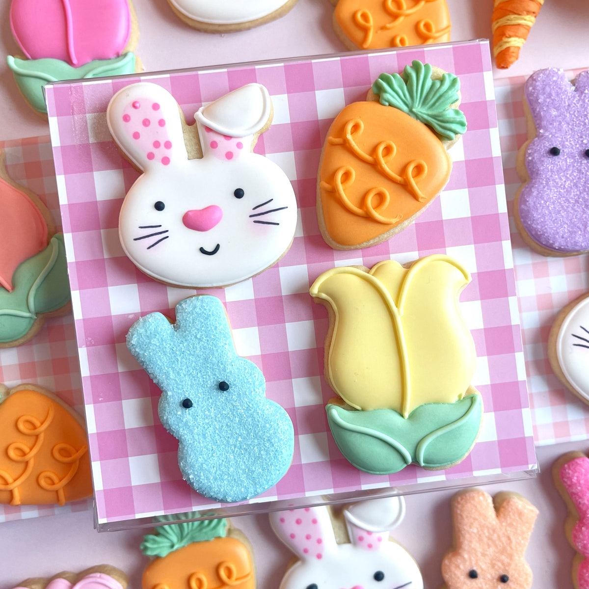 Mini Easter cookie cutter bundle featuring a white bunny-shaped cookie with pink polka-dot ears and black whiskers