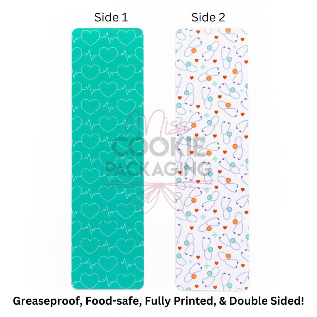 Double sided silicone mat with teal hearts and heartbeat pattern and white stethoscopes and hearts for nurse cookie bags