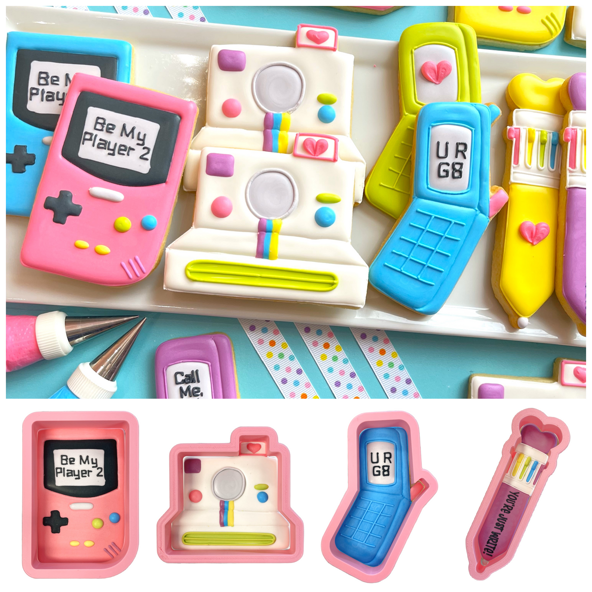 Pink fondant-coated game boy style cookie with be my player 2 message and colorful buttons in retro valentine cookie cutter bundle