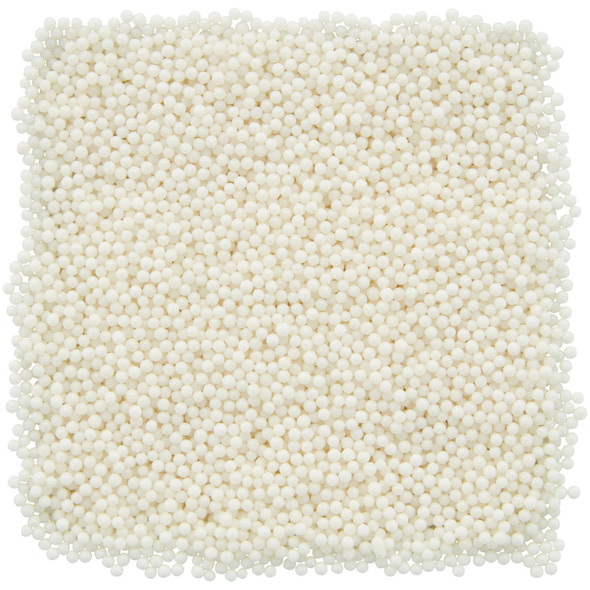 A square arrangement of uniform white nonpareils small sugar sprinkles in a clear jar for decorating desserts