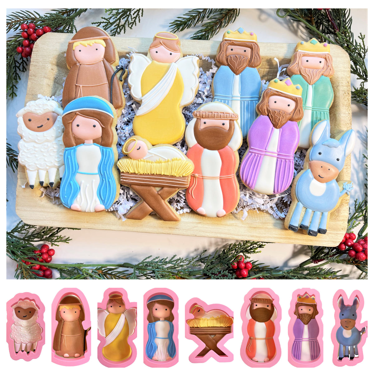 A set of christmas manger cookie cutter bundle cookies decorated with intricate yellow blue purple and brown icing designs