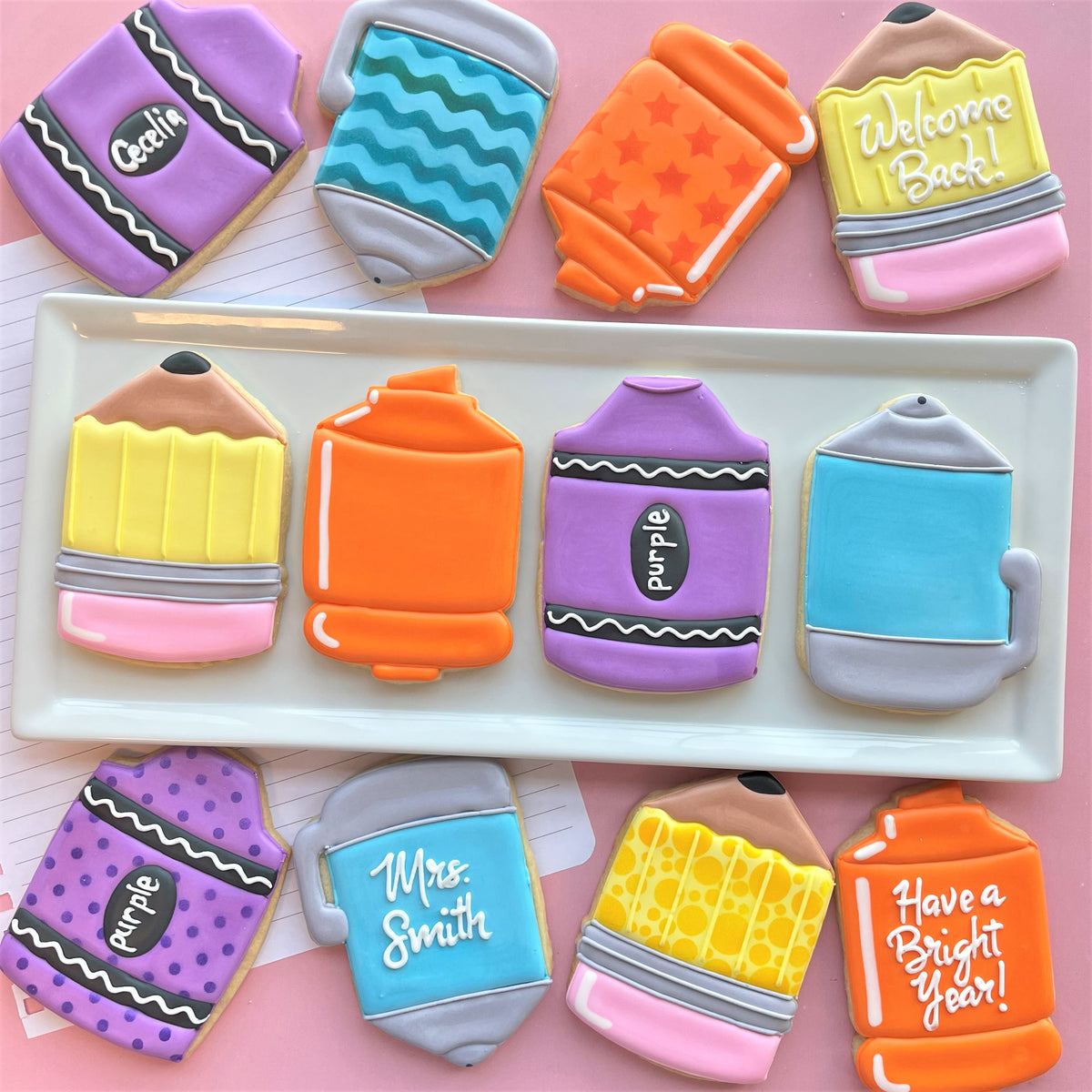 Colorful sugar cookies shaped like school supplies made using chubby xl pencil cookie cutter for baking fun