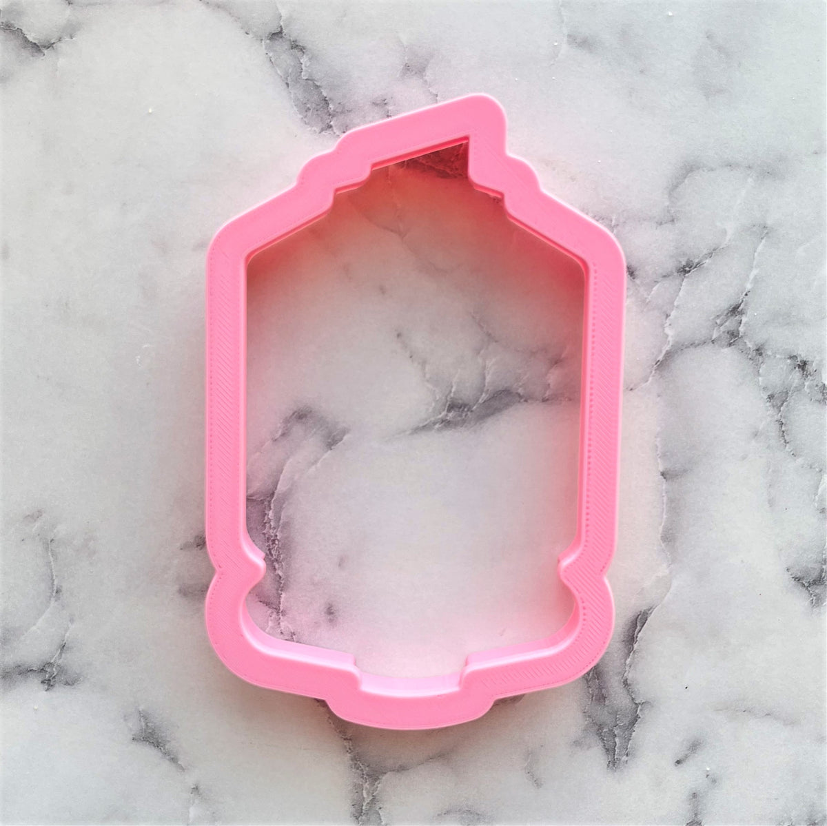 Pink plastic chubby xl highlighter cookie cutter shaped like a decorative lantern for baking and crafts
