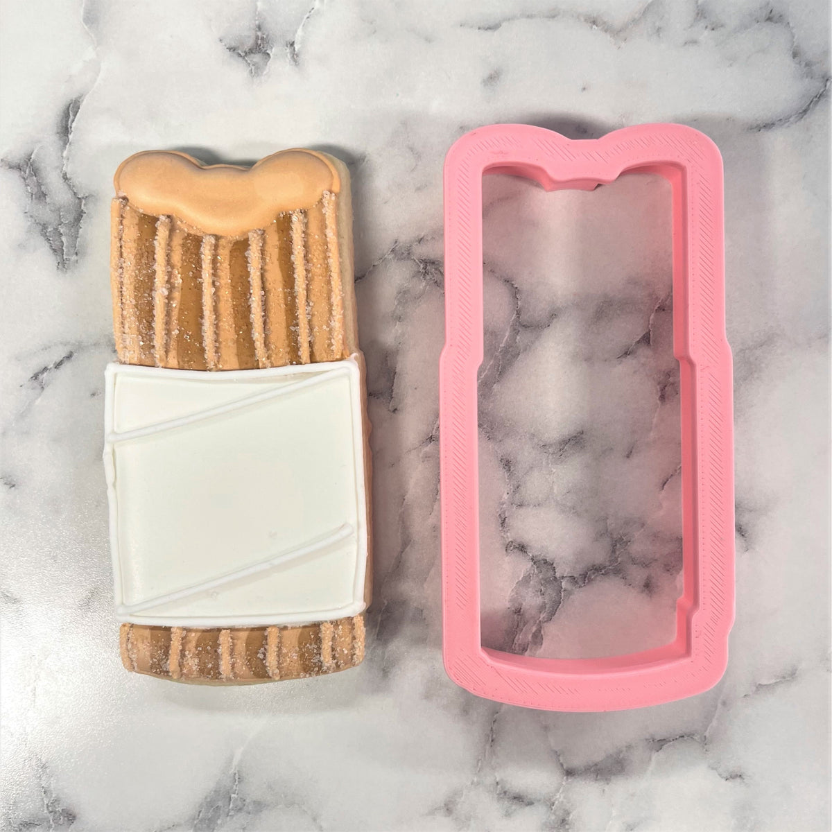 Pink silicone churro cookie cutter designed for baking and shaping churro-inspired cookies