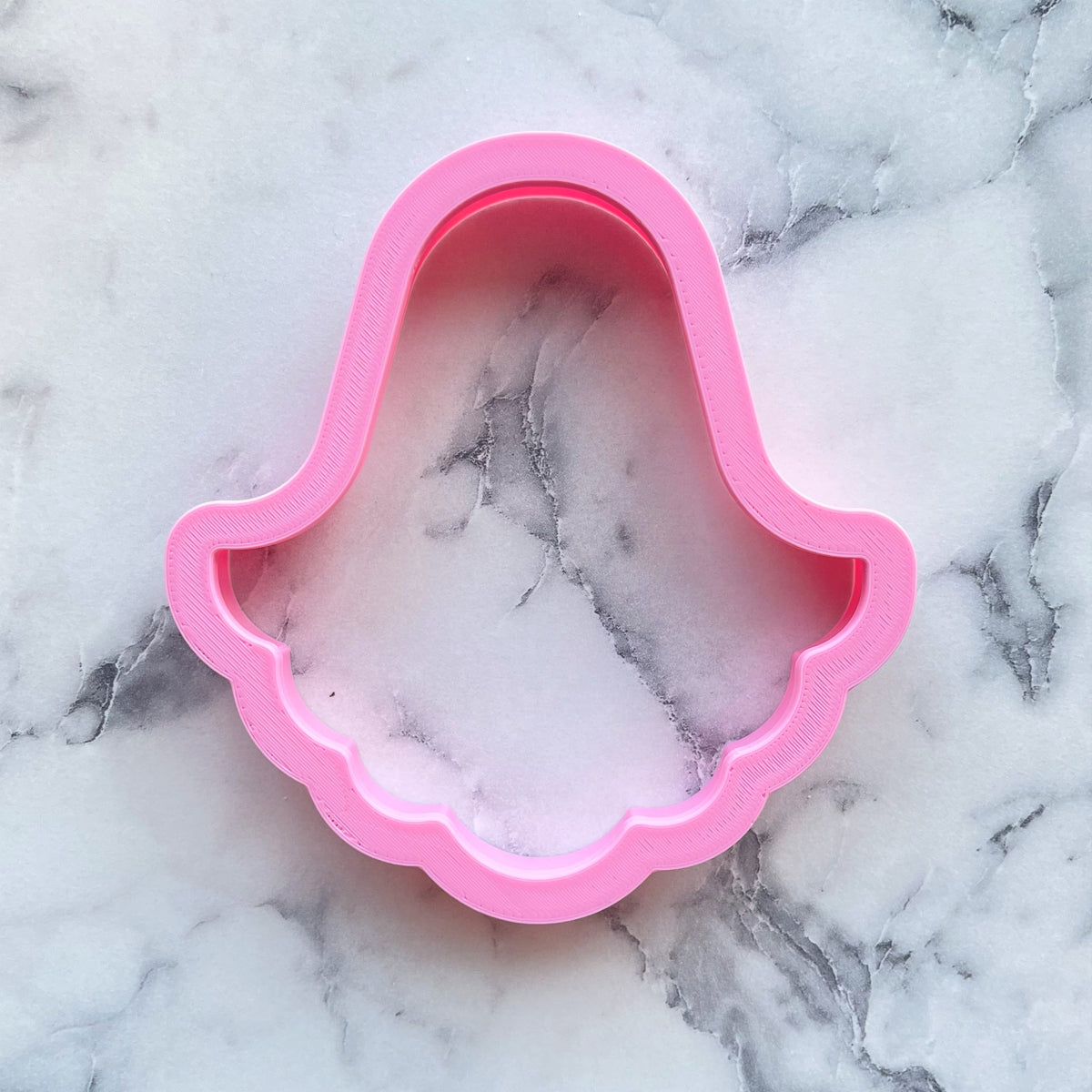Pink plastic hamsa hand shaped cookie cutter featured in the classic ghost cookie cutter product line