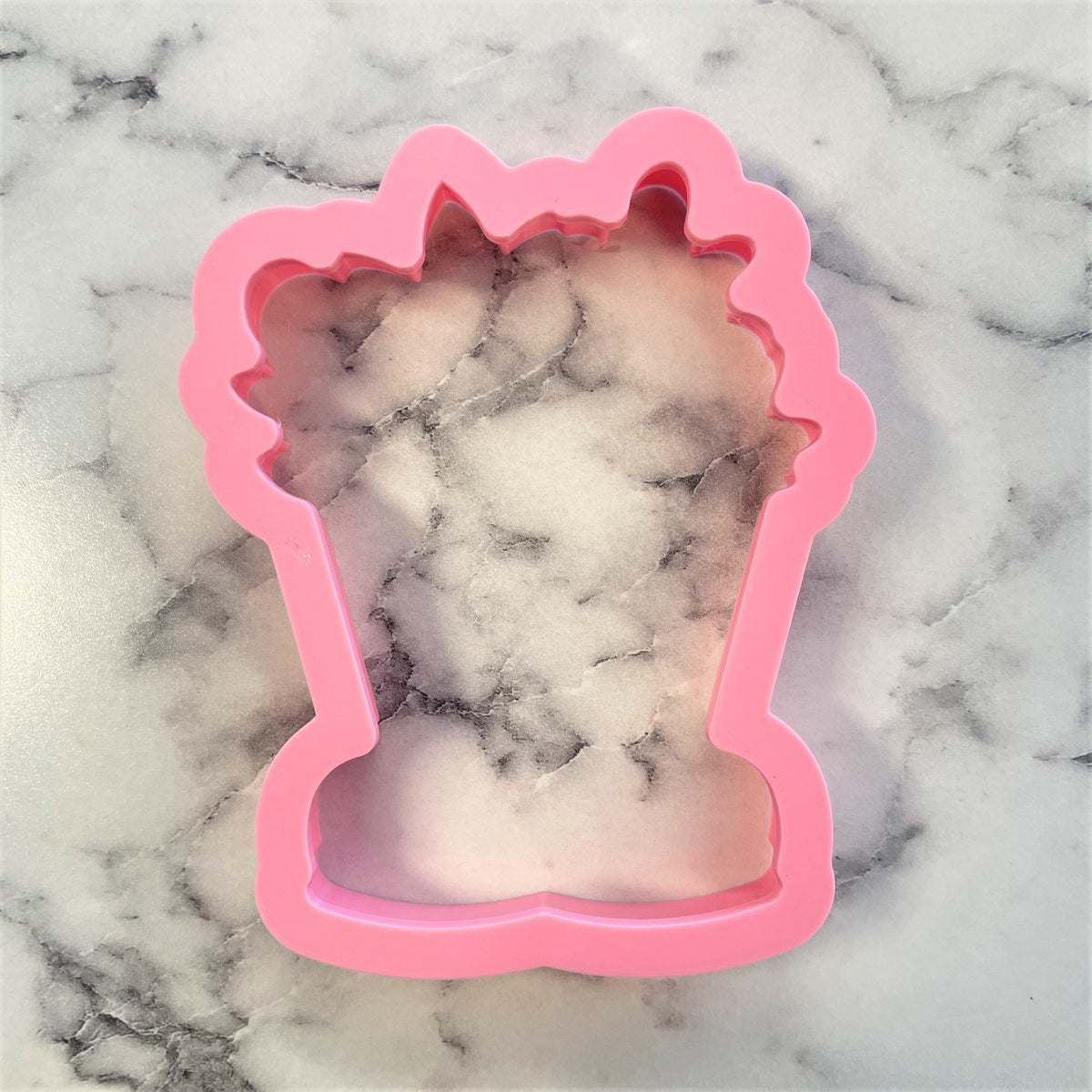 Pink silicone popcorn bucket cookie cutter from flower boots for baking and crafting uses
