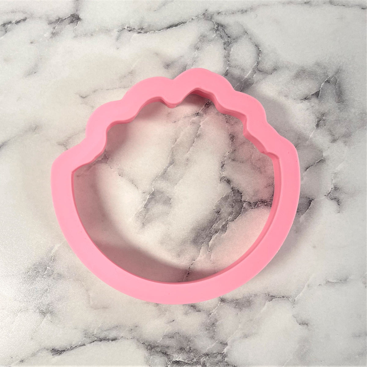 Pink silicone seashell-shaped mold for guacamole cookie cutter for making themed snacks and treats