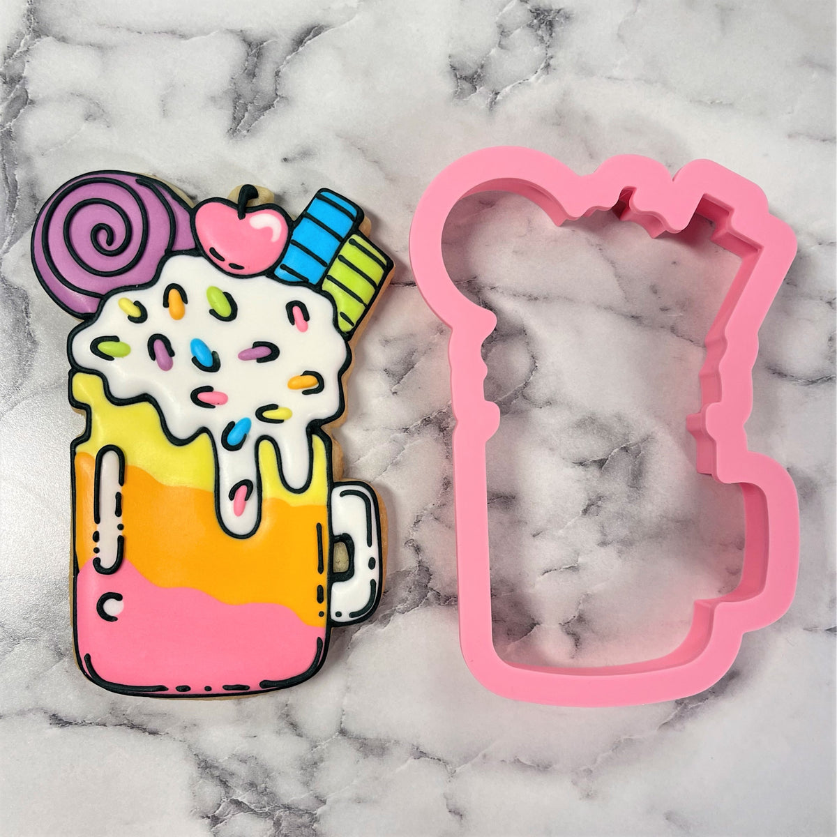 Milkshake jar cookie cutter with colorful rainbow layers and candy toppings in a playful cartoon style