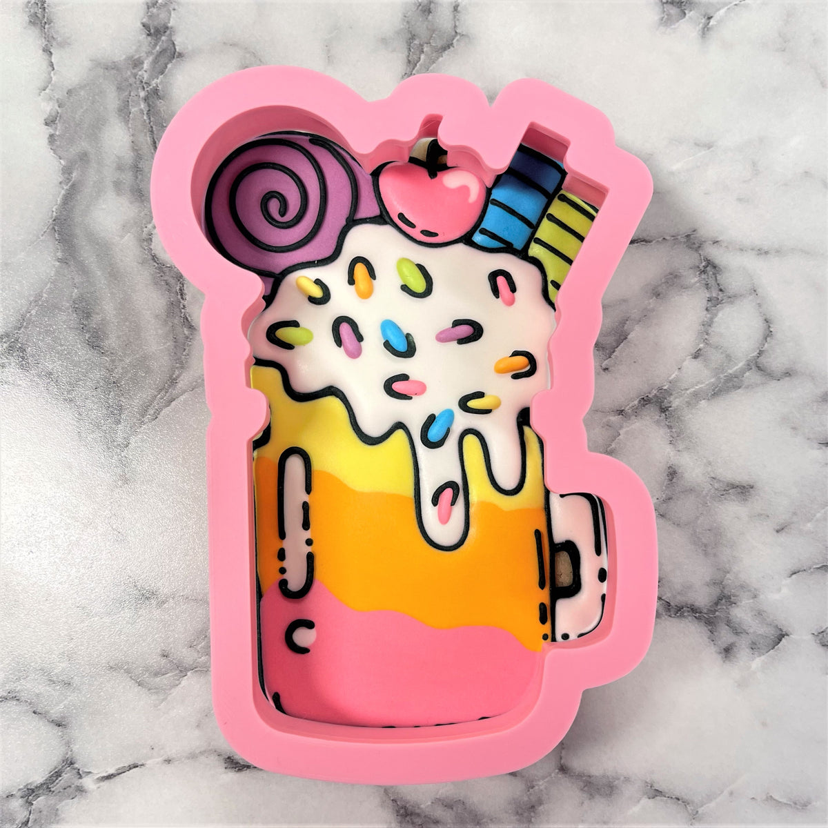 Pink silicone milkshake jar cookie cutter with colorful sprinkles lollipop and apple on top for baking crafts