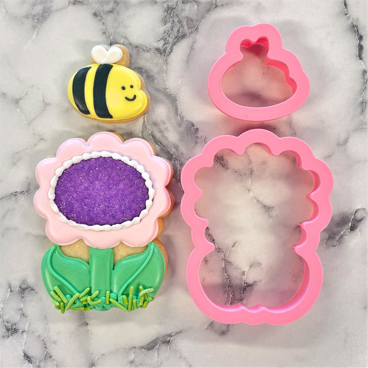 Pink silicone bee and flower cookie cutters with green leaves from happy daisy mini bumblebee flour box club set