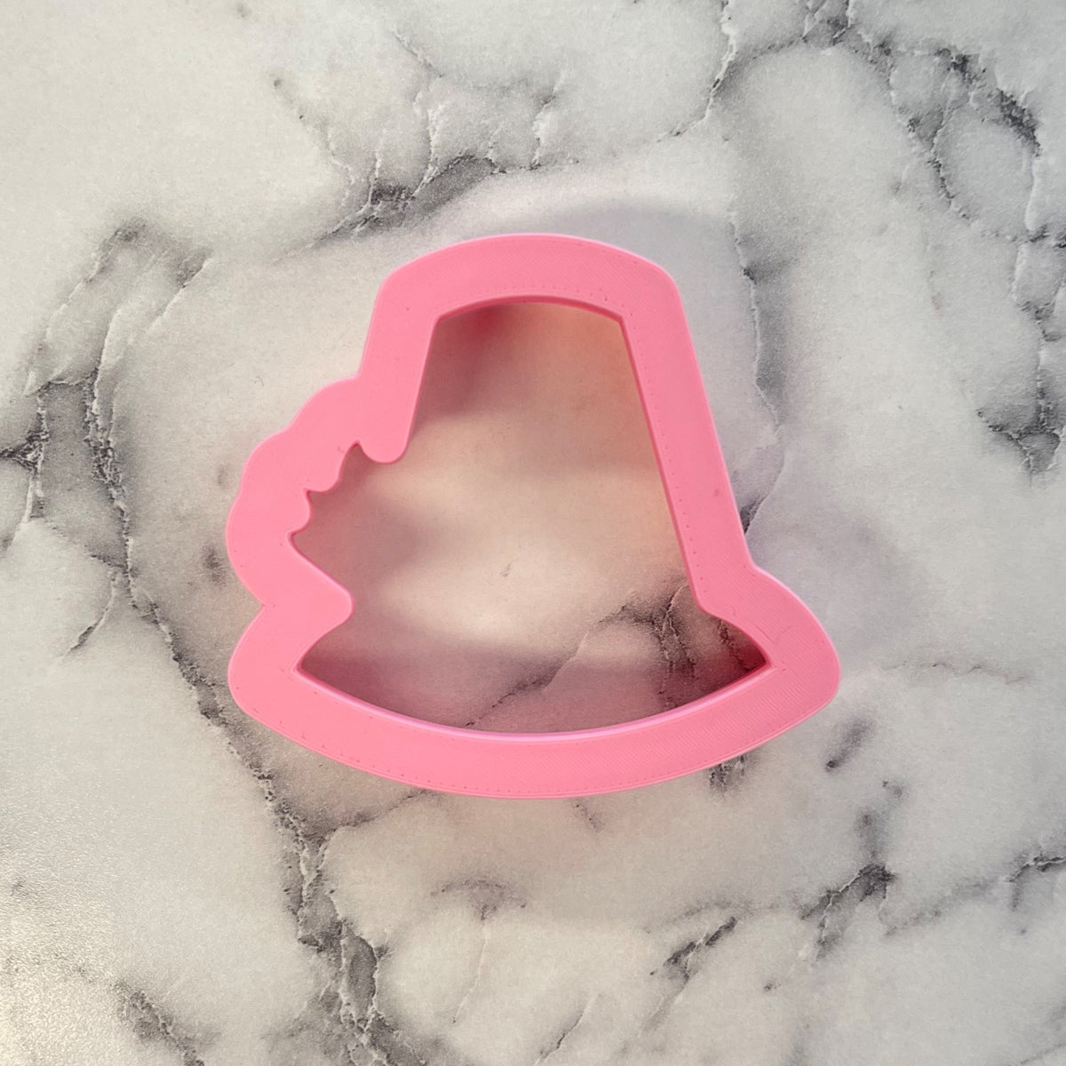 Mini thanksgiving hat cookie cutter made of pink silicone shaped like a bell for festive baking