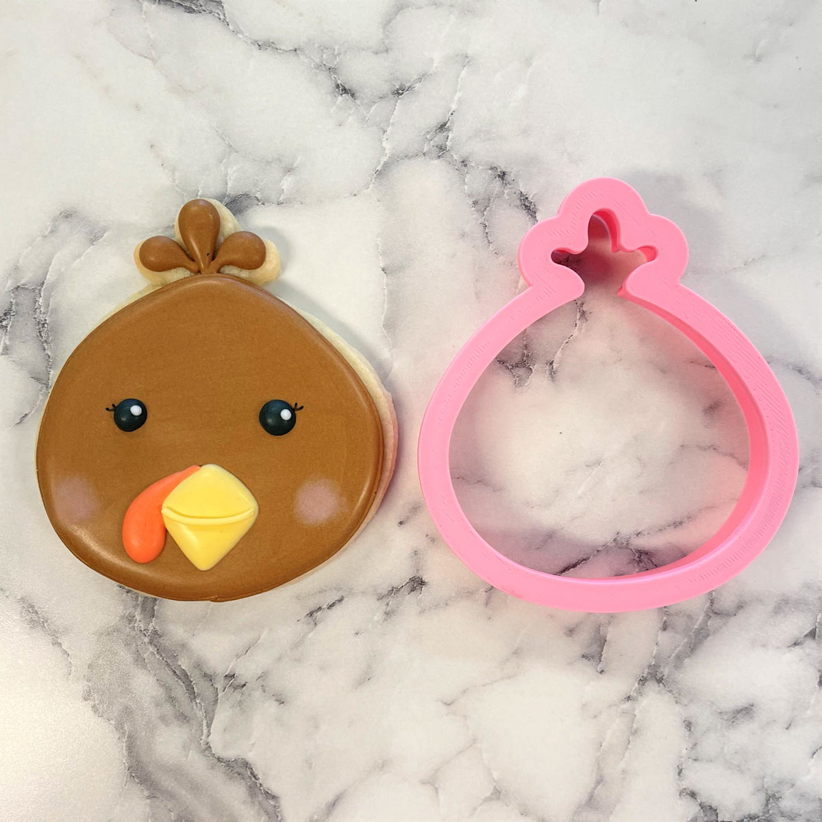 Thanksgiving turkey cookie cutter pink plastic chicken shape with star detail on head for festive baking