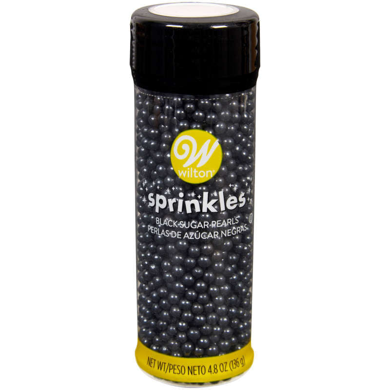 A cylindrical container of Wilton black sugar pearl sprinkles with a glossy black lid and silver glittery beads inside
