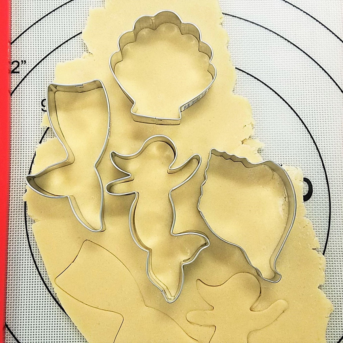Set of stainless steel stainless steel sea-themed cookie cutters including seashell dolphin mermaid and whale shapes