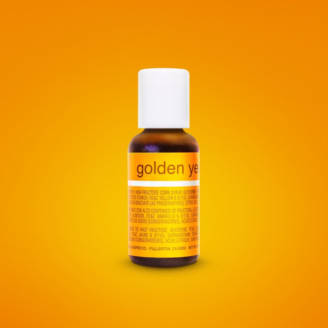 A small amber glass bottle of chefmaster liqua-gel golden yellow food coloring with a white cap and orange label