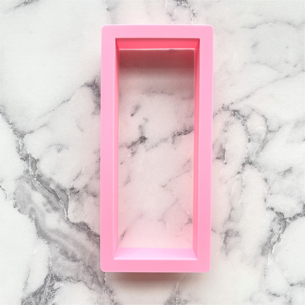Pink rectangular tall silicone soap mold designed for making soaps and cookies with easy release features