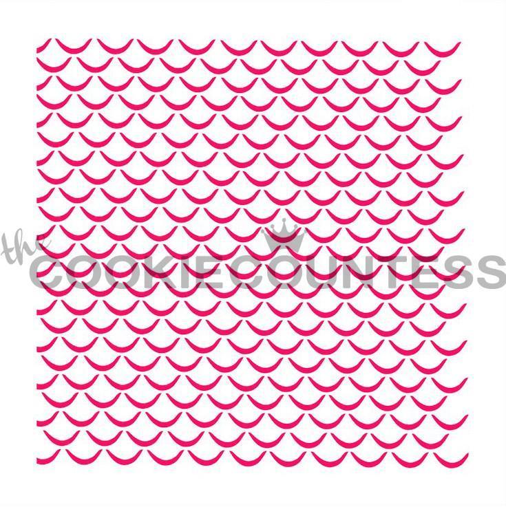 Pink scalloped cookie cutter stencil with small crown design in center for scales outline baking and decorating