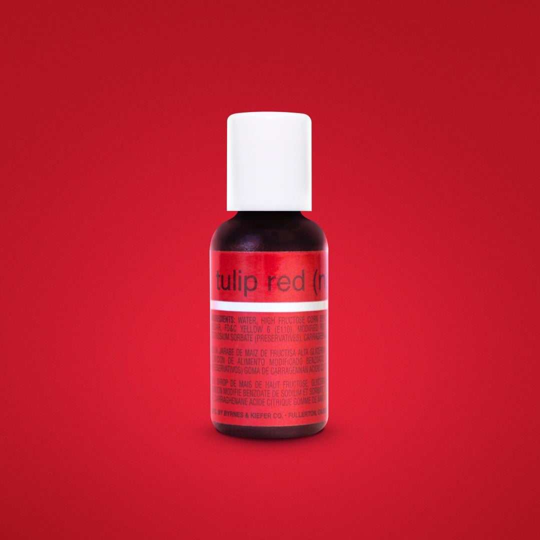 A small bottle of tulip red chefmaster liqua-gel food coloring .70oz with white cap and red label containing dark liquid